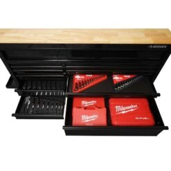Husky 62 In. W X 36 In. D Standard Duty 12-Drawer Mobile Workbench Tool Chest With Full Length Extension Table In All Black -Husky Tools Shop gloss black with black trim husky mobile workbenches hotc6212b11m 4f 1000