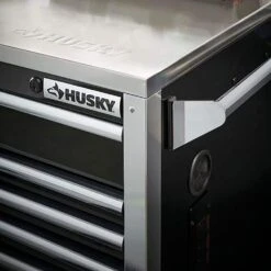 Husky Tool Storage 72 In. W X 25 In. D Professional Duty Black Mobile Workbench Cabinet With Stainless Steel Top -Husky Tools Shop gloss black with silver trim husky mobile workbenches hpro72mwc20blk 77 1000