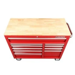 Husky 42 In. W X 18.1 In. D Standard Duty 10-Drawer Mobile Workbench Tool Chest With Solid Wood Top In Gloss Red -Husky Tools Shop gloss red with silver finishes husky mobile workbenches h42mwc10r tl a0 1000