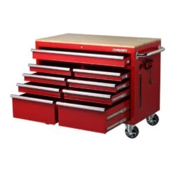 Husky 46 In. W X 24.5 In. D Standard Duty 9-Drawer Mobile Workbench Tool Chest With Solid Wood Top In Gloss Red -Husky Tools Shop gloss red with silver trim husky mobile workbenches h46mwc9rv2 c3 1000