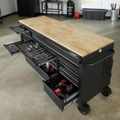 Husky 72 In. W X 24 In. D Heavy Duty 18-Drawer Mobile Workbench Cabinet With Adjustable-Height Hardwood Top In Matte Black -Husky Tools Shop matte black with black trim husky mobile workbenches holc7218bb1mys 1d 1000