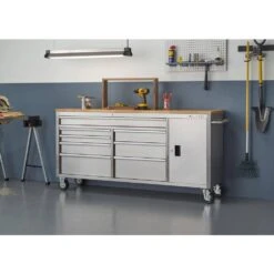 Husky 72 In. W X 18 In. D Heavy Duty 8-Drawer 1-Door Mobile Workbench Tool Chest With Solid Wood Top In Stainless Steel -Husky Tools Shop stainless steel with silver trim husky mobile workbenches hyls 7208 31 1000